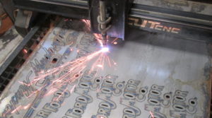 cutting the ford motor company 1903 logos